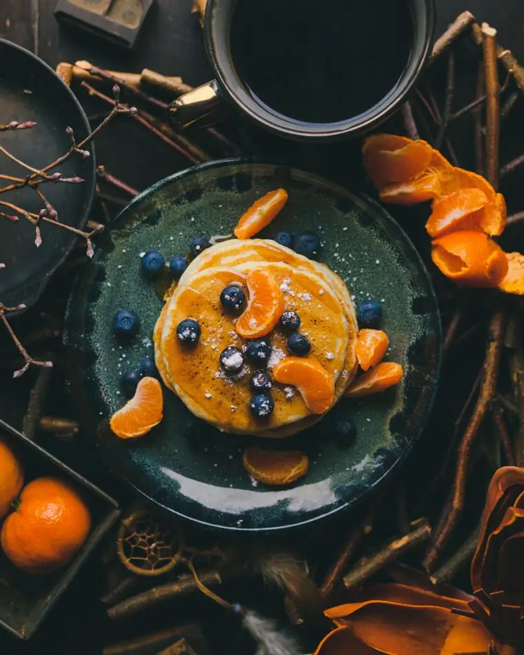 Crepe plated with berries and chocolate