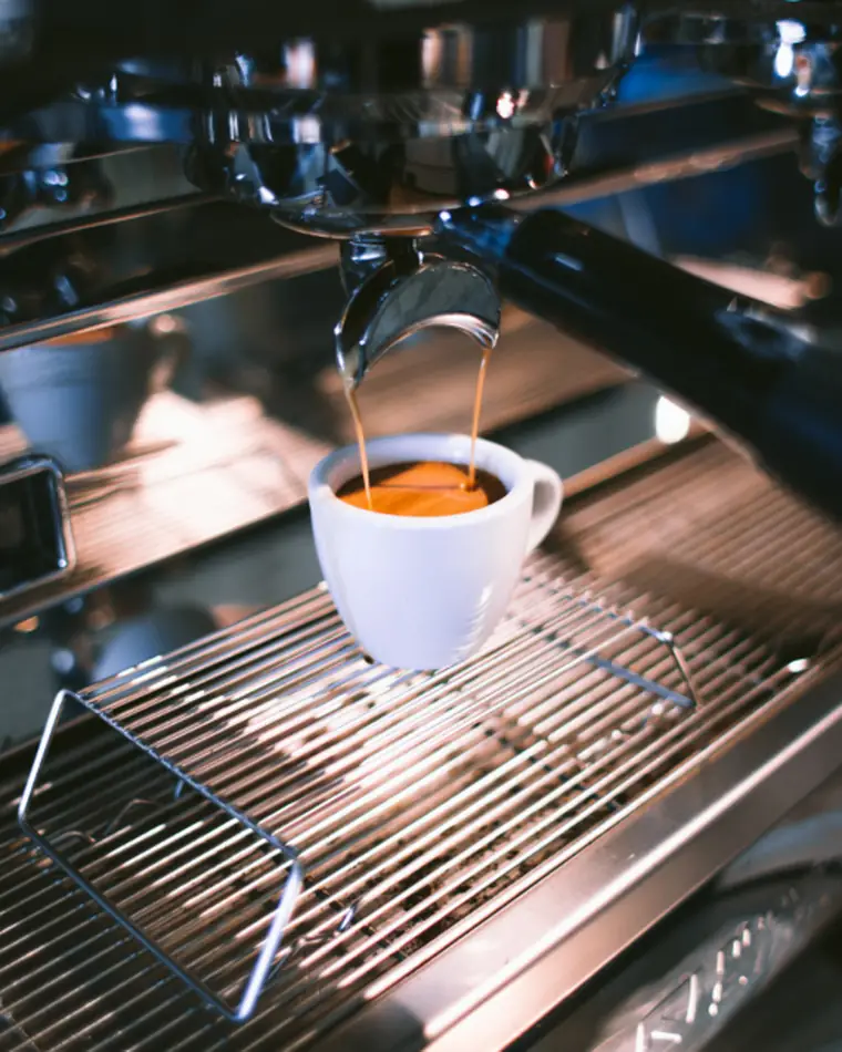 Espresso pulling from the machine